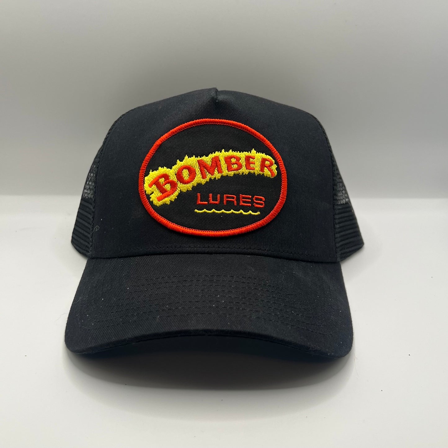 Bomber Lures Patch Cap | Black Trucker Snapback