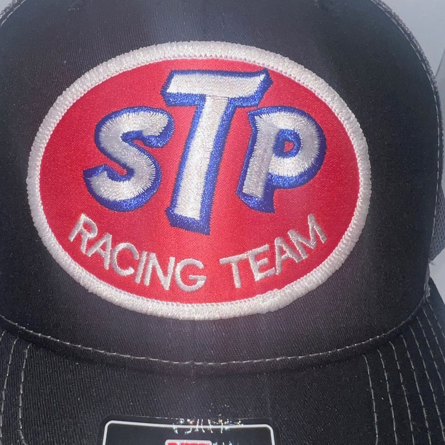 STP Racing Team Patch Cap – Richardson 112 Black/Charcoal Snapback Trucker